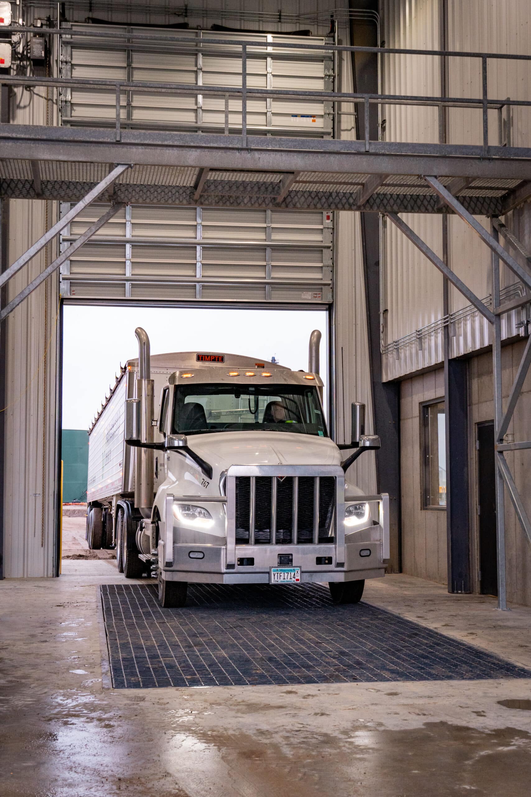 Semi pulling fuel truck into elevator Semi pulling fuel truck into elevator