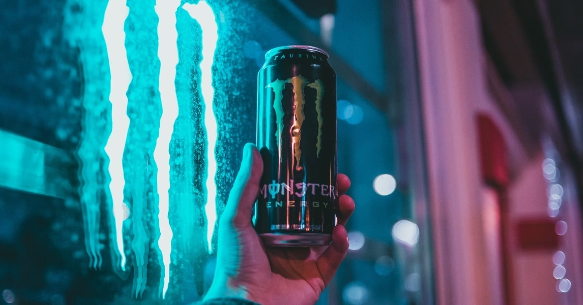 Can of Monster Energy Drink Being Held